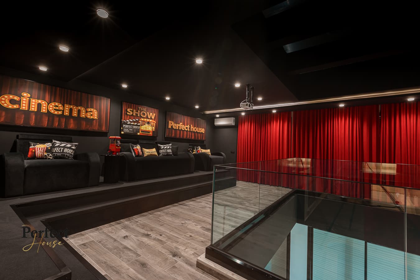 Private cinema room with tiered lounge seating
